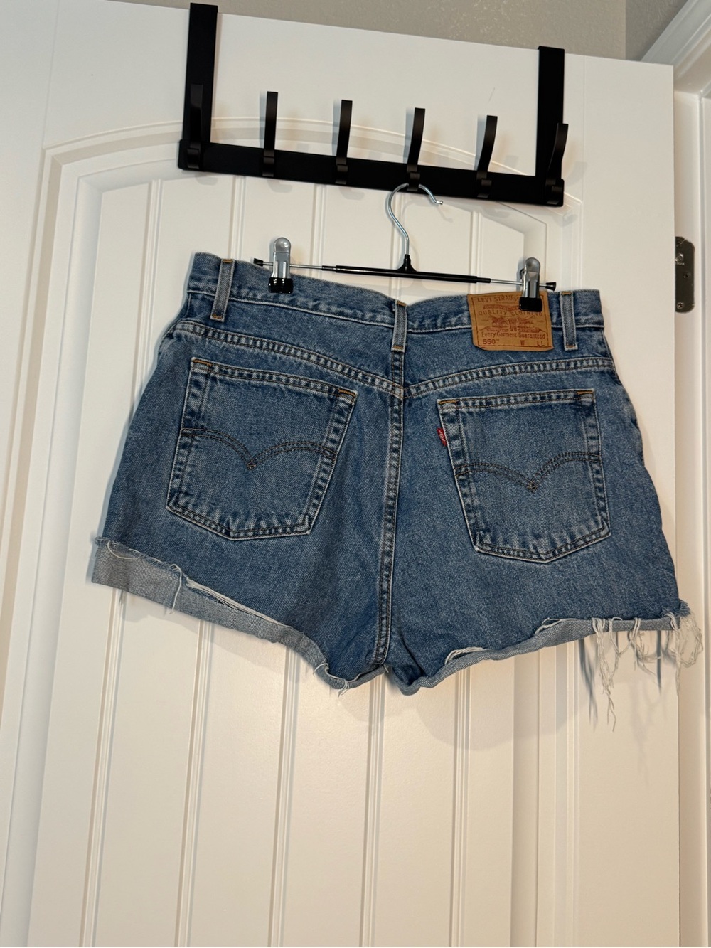 Levi's 550 Blue Cutoff Denim Shorts with Frayed Hem